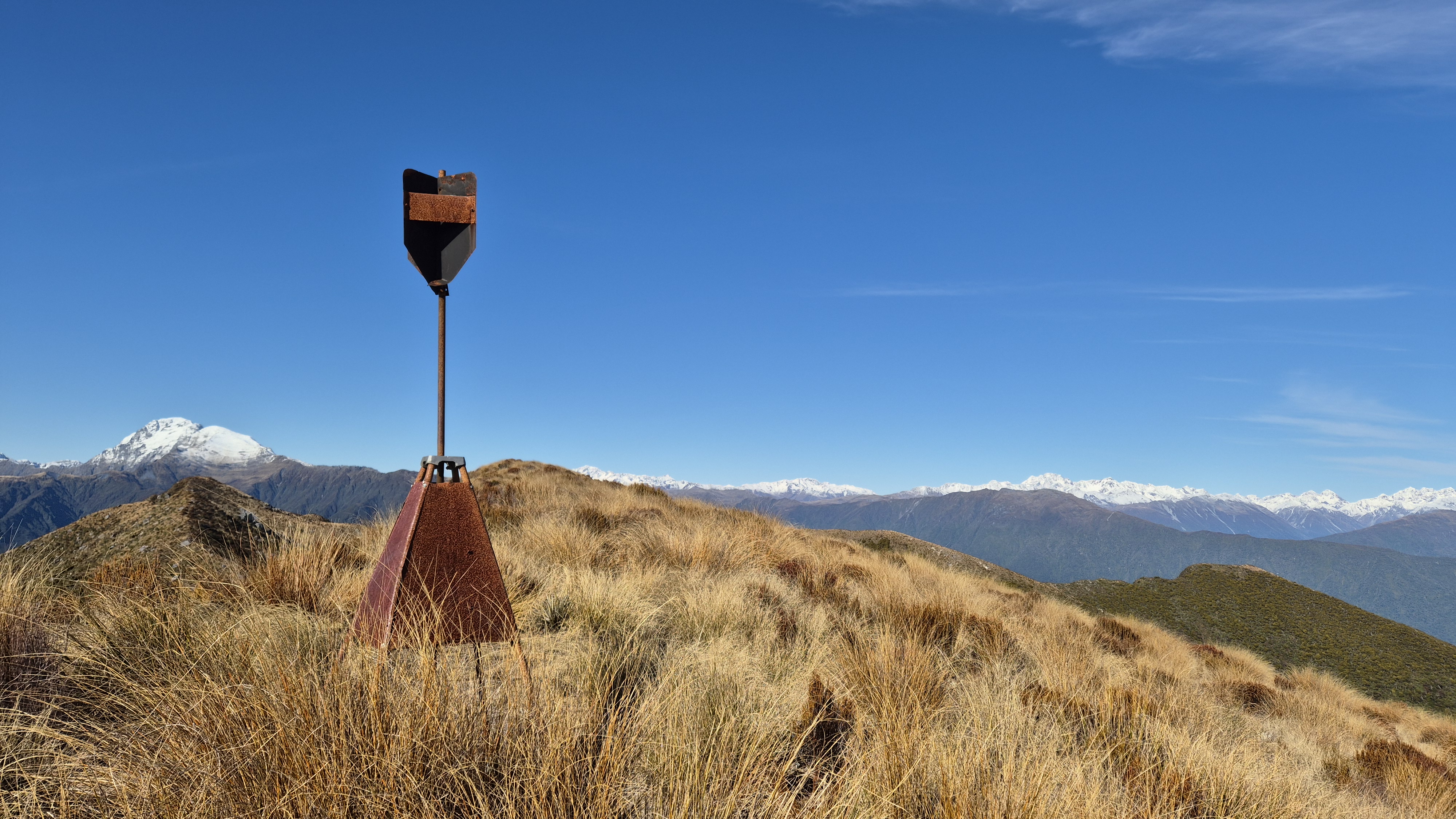 Approaching the trig at Te Kinga (1196m), with Mt Alexander beyond