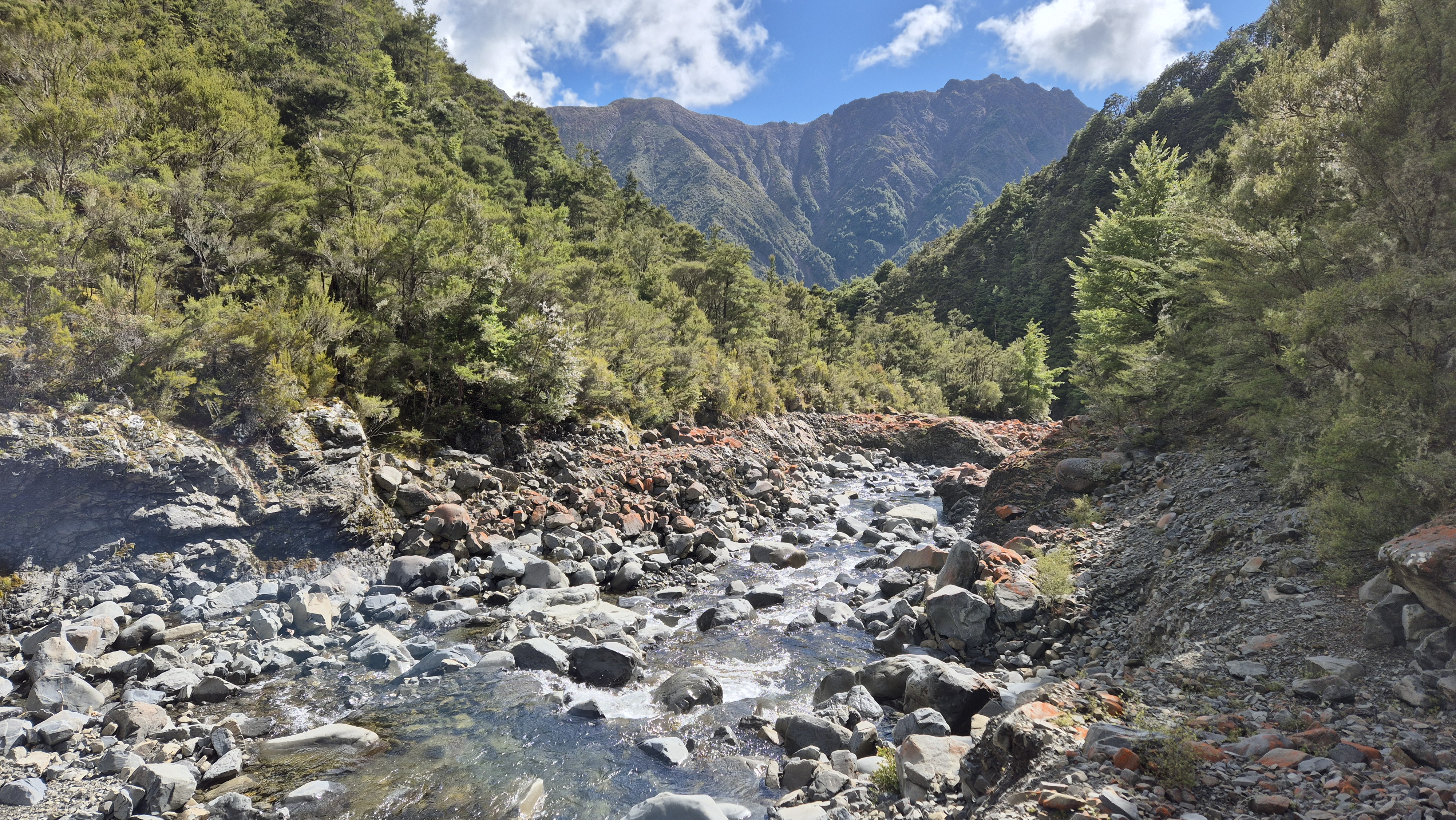 Heading back down Gosling Stream from Gosling Hut